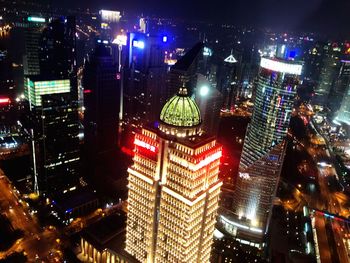 High angle view of illuminated buildings at night