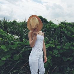 Woman standing on field