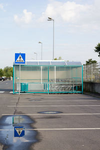 Empty parking area against the sky