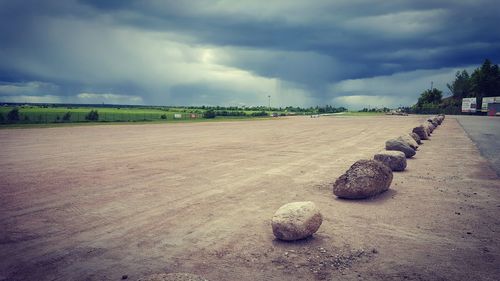 View of landscape against cloudy sky