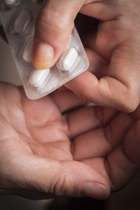 Close-up of person holding hands