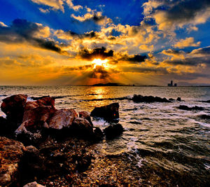 Scenic view of sea against sky during sunset