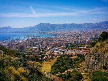 Cityscape with mountain range in background