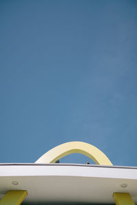 Low angle view of building against blue sky