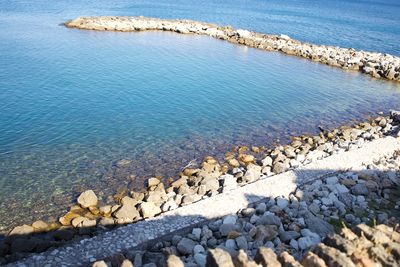 High angle view of stones on beach