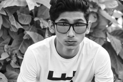 Portrait of young man wearing eyeglasses