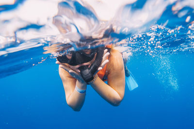 Man swimming in sea