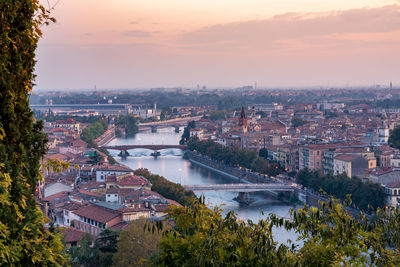 High angle view of river amidst buildings in city