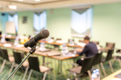 Close-up of microphone in conference room