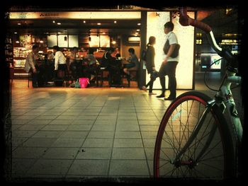 Blurred motion of people in city at night