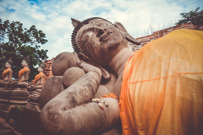 Low angle view of statue against sky