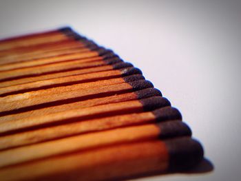 Close-up of matchsticks on table