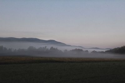 Scenic view of agricultural field against sky during autumn