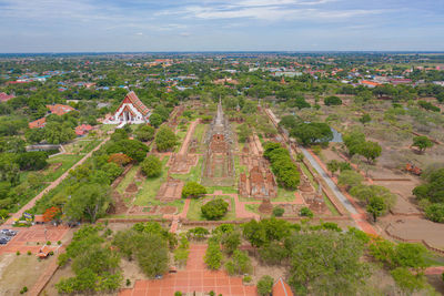 High angle view of trees and buildings against sky