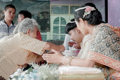 Young couple kissing in temple