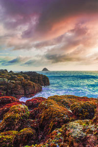 Scenic view of sea against sky during sunset