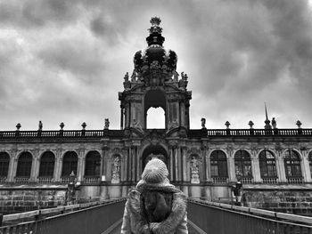 Low angle view of historical building against cloudy sky