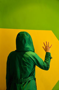 Close up of man standing on table