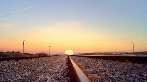 Railroad track at sunset