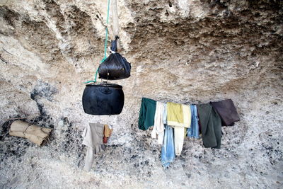 Clothes hanging against rock formation