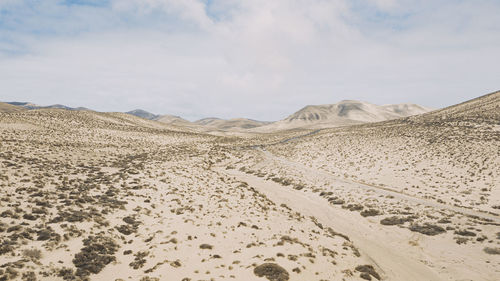 Scenic view of desert against sky