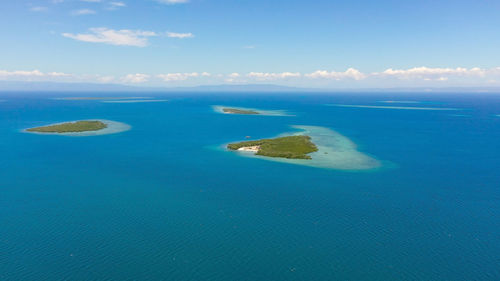 Tropical islands and blue sea against the sky with clouds. the strait of cebu,philippines.