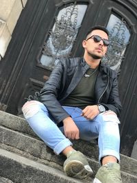 Portrait of young man wearing sunglasses