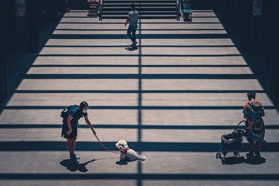 Low angle view of man walking on steps