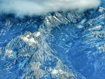 Scenic view of snow covered mountains