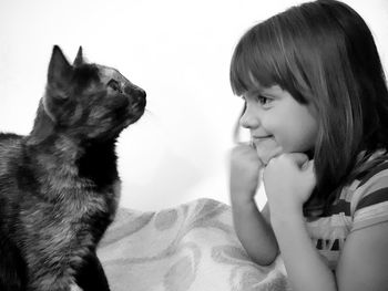 Cute girl with cat at home