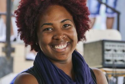 Portrait of cheerful redhead woman