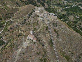 High angle view of road passing through land