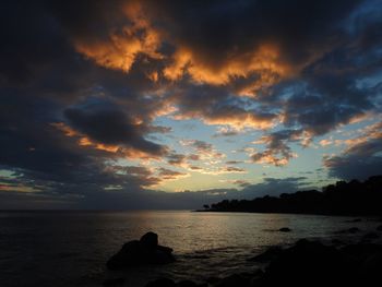 Scenic view of sea against sky during sunset