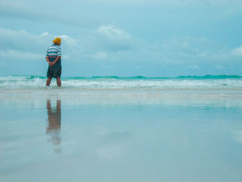 Man standing on beach