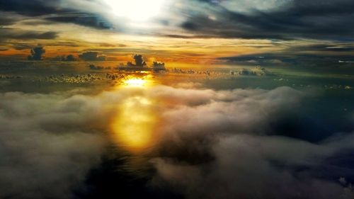 Scenic view of cloudy sky at sunset