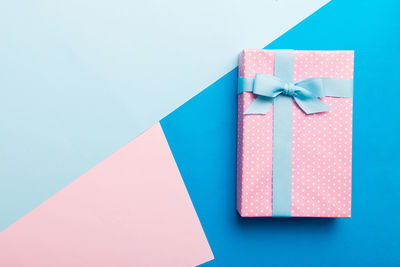 High angle view of gift box on white background