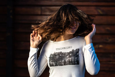 Young woman smiling with text