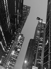 Low angle view of modern buildings against sky