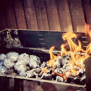 Close-up of bonfire on barbecue grill