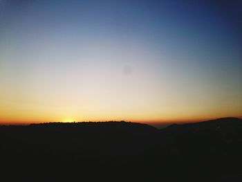 Silhouette of landscape at sunset