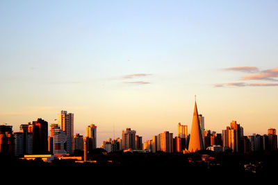 View of buildings against sky during sunset