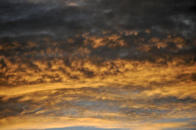 Low angle view of cloudy sky during sunset