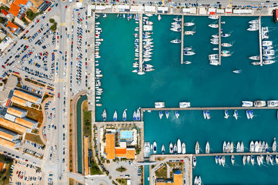 Aerial view of boats in harbor in lefkada city