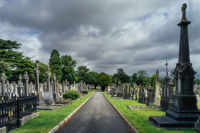 Graves with celtic crosses and sculptures in glasnevin cemetery, ireland