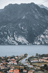 High angle view of townscape by sea