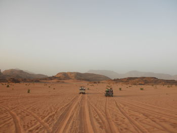 Scenic view of desert against clear sky