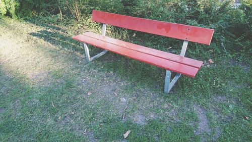 High angle view of empty bench in park