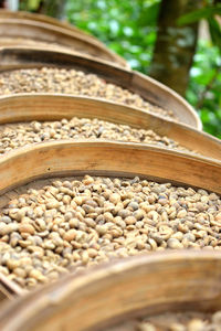 Close-up of coffee beans in container