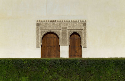Detail of moorish style door and window in alhambra, granada, spain