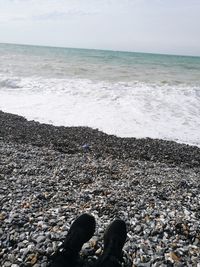 Low section of person on beach